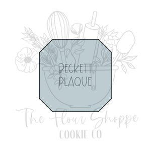May include: An octagonal cookie cutter with the text "BECKETT PLAQUE" inside a light blue shape. The words "The Flour Shoppe COOKIE CO" are below the shape. The background features line drawings of baking tools and floral elements.