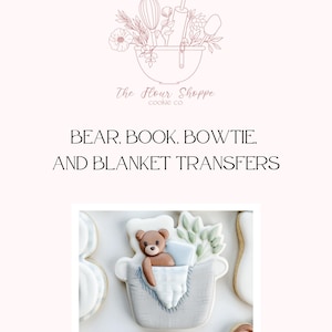 May include: A decorated cookie depicting a teddy bear in a gray basket with a blanket and pillow. Other decorated cookies surround it. The image includes the text "BEAR. BOOK. BOWTIE. AND BLANKET TRANSFERS."