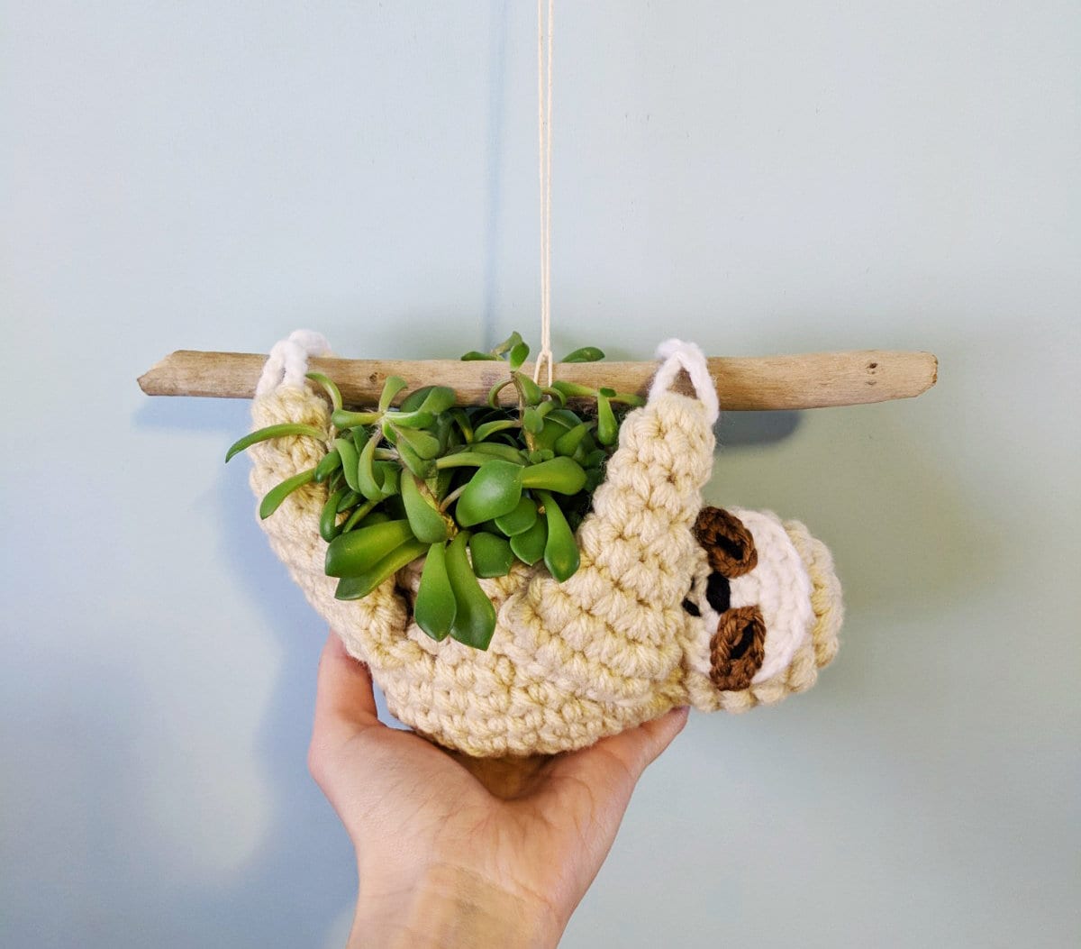 33 Succulent Crochet Patterns for Easy Indoor Garden Decor and Handmade Gifts 10 sloth planter crochet