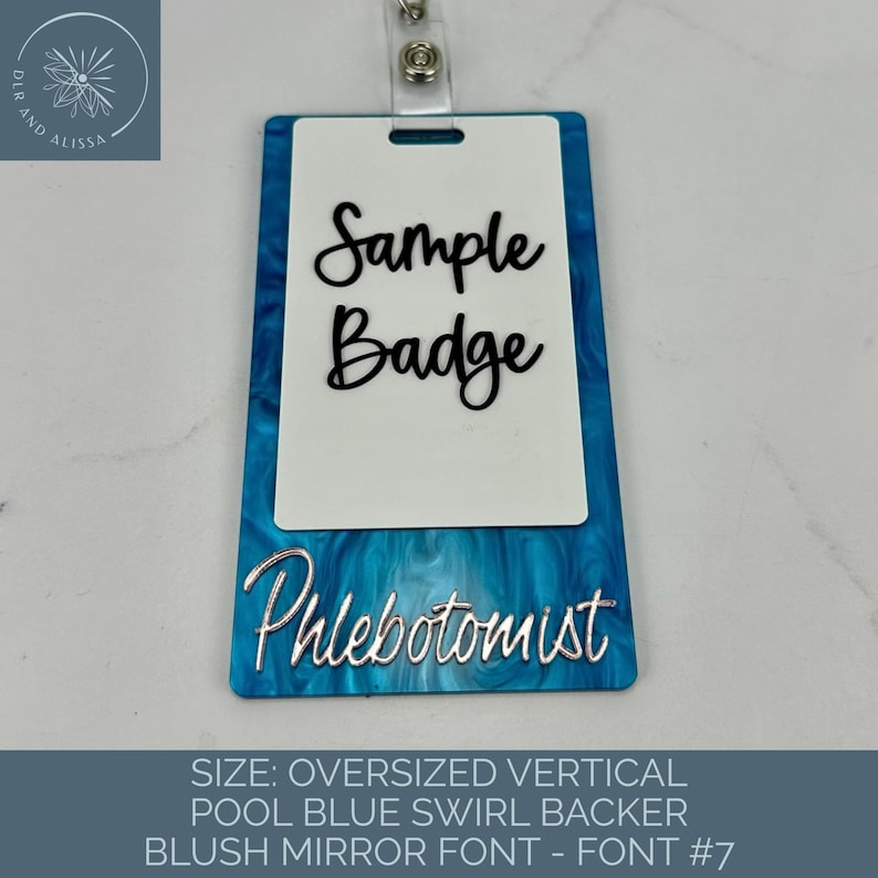 May include: A vertical rectangular badge holder with a pool blue swirl pattern backer. A white insert features the black text Sample Badge in a script font. The word Phlebotomist is written in a silver script font at the bottom of the backer.