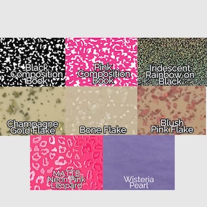 May include: A grid of eight material swatches featuring various patterns and textures: black composition book, pink composition book, iridescent rainbow on black, champagne gold flake, bone flake, blush pink flake, matte neon pink leopard, and wisteria pearl.