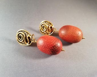 Red-bellied clip on earrings