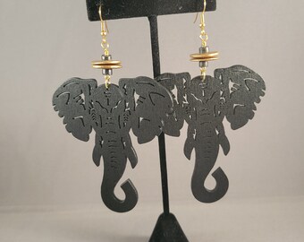 Elephas Chic black with gold earrings | bold safari Afrocentric