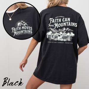 May include: Black t-shirt with white graphic text and mountain scene. The front reads "Faith Moves Mountains" and the back says "Faith Can Move Mountains" with a mountain and horse illustration. "Christian Cowboy Frontier" is also printed.