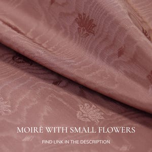 variant of moire fabric for upholstery with jacquard tone on tone motif of small flowers in antique pink