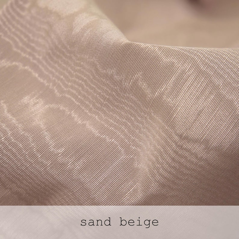 Neutral oatmeal beige fabric texture close-up with a soft sheen and horizontal rippled pattern. Ideal for neutral tone flat lays, organic modern decor, and clean minimalist product design.