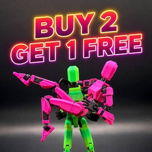 May include: A neon sign displays "BUY 2 GET 1 FREE" above three articulated figures. The figures are in bright colors: green, pink, and black. The figures are posed in a dynamic embrace, suggesting action.