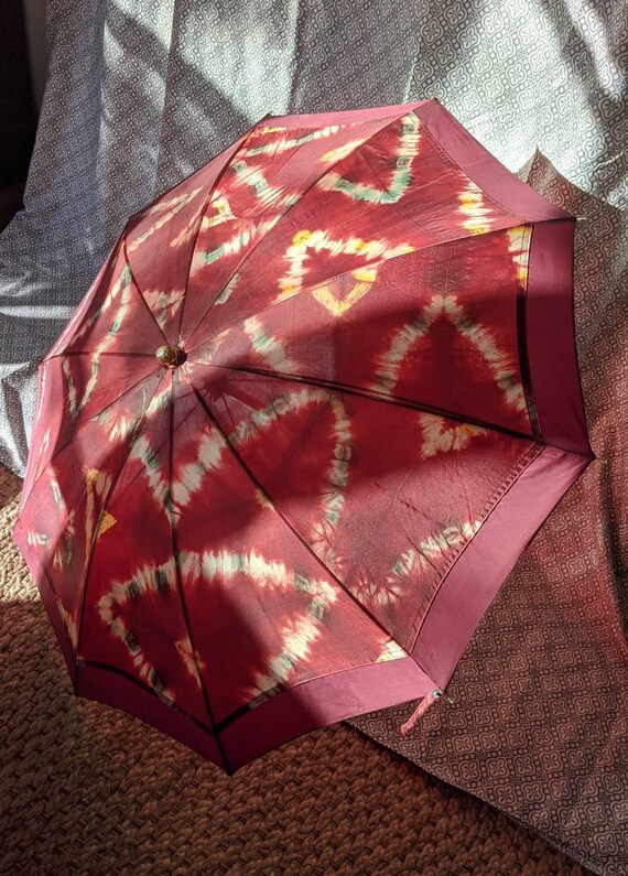 Carved lucite handle umbrella tie dye fabric dark 