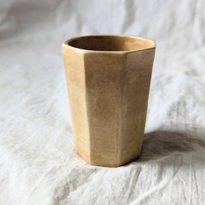 Early ceramic cup manufactured octagon