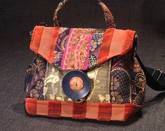Small classic upholstery bag