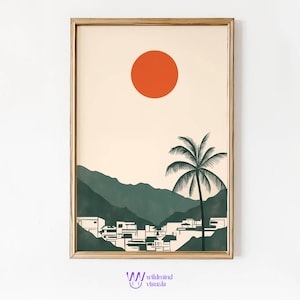 May include: A framed print with a minimalist design featuring a large orange sun, a palm tree, and a silhouette of a town in the background. The print has a cream background and a gold frame.