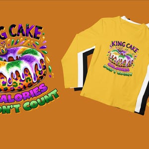 May include: A yellow long-sleeve shirt with a king cake design and the text "King Cake Calories Don't Count".