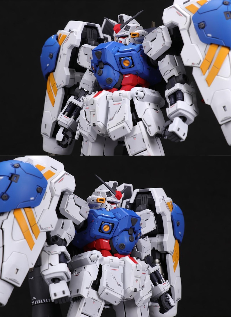 Puede incluir: Modelo detallado de un robot, con una combinaci&oacute;n de colores blanco, azul, rojo y amarillo. El robot tiene una gran armadura en los hombros y detalles mec&aacute;nicos intrincados. El modelo est&aacute; sobre un fondo oscuro.