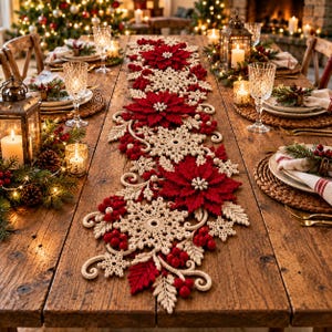 May include: A long, decorative table runner featuring a crochet pattern of red poinsettia flowers, cream-coloured snowflakes, and clusters of red berries. The runner is laid out on a wooden table, creating a festive centrepiece for holiday dining.