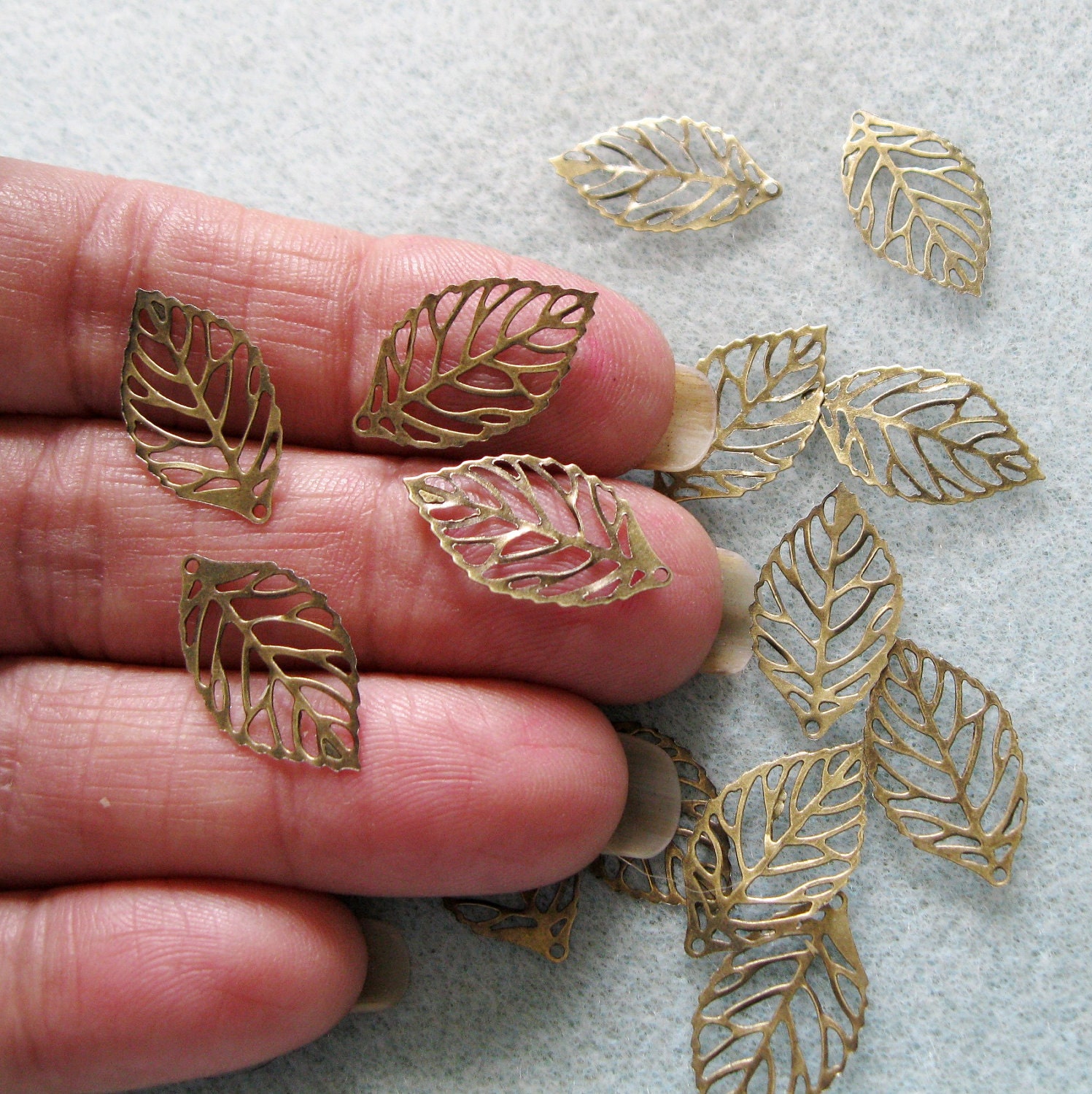 Itty Bitty Antique Bronze Filigree Leaves 10mm x 20mm 538