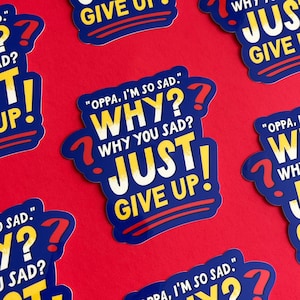 May include: Multiple stickers with a blue border and the text "OPPA, I'M SO SAD." and "WHY? WHY YOU SAD? JUST GIVE UP!" in white and yellow. Red question marks and a red background.
