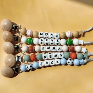 Clip para chupete personalizado, cadena para chupete de bebé, regalo para bebé niño niña, regalo para el regreso a casa, regalo para baby shower, calidad artesanal, para fanáticos del fútbol y el baloncesto.