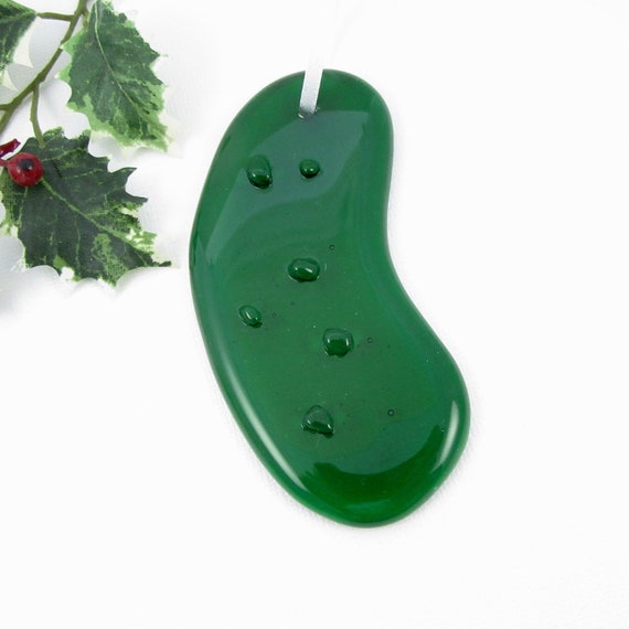 Fused glass is a real craft skill, and the Christmas pickle tradition is a genuine conversation-starter — this is a cleverer execution than the usual mass-produced pickle ornament.