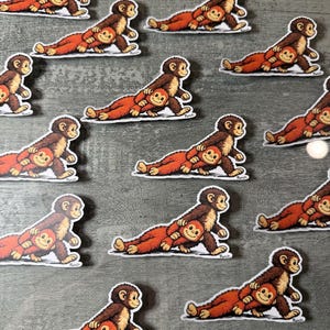 Punch Monkey Sticker, Playful Orangutan Companion, Water-Resistant Vinyl Decal