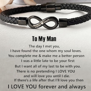 May include: A black leather bracelet with an infinity symbol charm engraved with the names "Helen" and "Mark". The text below the charm reads: "The day I met you, I have found the one whom my soul loves. You complete me & make me a better person I was a little late to be your first But I want all of my last to be with you. There is no pretending I LOVE YOU and will love you until I die. If there's a life after that I'll love you then I LOVE YOU forever and always"