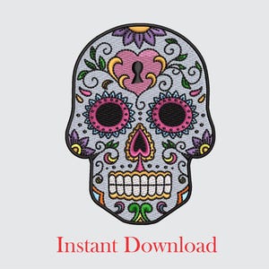 May include: A colorful embroidered sugar skull design with pink, yellow, blue, green, and purple details. The skull has a heart-shaped nose and a floral pattern around the eyes.