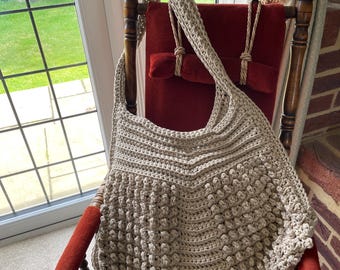 Large beige crocheted tote bag