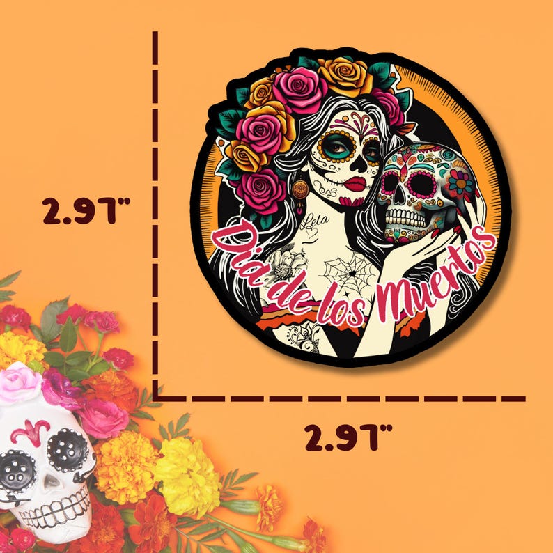 May include: A circular sticker featuring a sugar skull-themed character with floral hair accessories, holding a decorated skull. The text "Dia de los Muertos" is printed in pink. The sticker measures 2.97 inches by 2.97 inches as indicated by the markings.