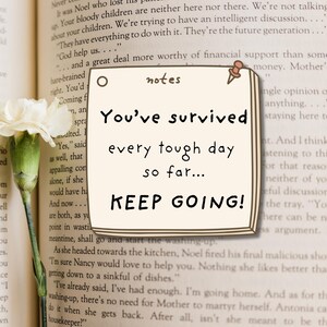 May include: A square cream-colored sticky note with a brown pushpin at the top right corner. The note features the word notes at the top and the text You've survived every tough day so far... KEEP GOING! in a dark brown handwritten font.