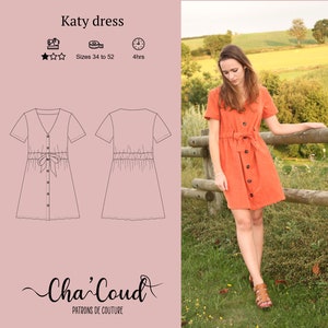 May include: A sewing pattern for a Katy dress, featuring a V-neck, short sleeves, and a tie at the waist. The pattern is available in sizes 34 to 52 and takes approximately 4 hours to complete. The image also shows a woman wearing a similar dress in a bright orange colour.