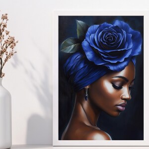 May include: A painting of a woman with dark skin wearing a blue turban with a large blue rose on top. The woman has her eyes closed and is looking down. The background is a dark blue.