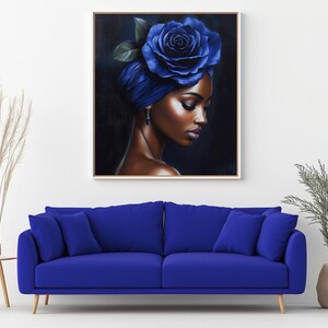May include: A painting of a woman with dark skin wearing a blue turban with a large blue rose on top. The woman is looking down and her eyes are closed. The background is dark blue.
