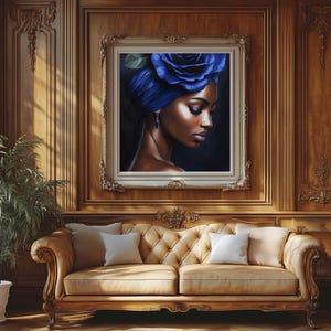 May include: A framed painting of a woman with a blue flower in her hair. The woman has dark skin and is wearing a blue turban. The background is a dark blue.