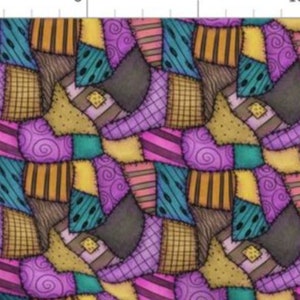 May include: A fabric pattern featuring a repeating patchwork design of boots in shades of purple, teal, yellow, and brown. The print includes various textures such as swirls, stripes, and grids, with a visible ruler at the top showing inches.