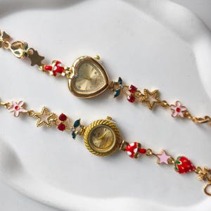 Whimsical Strawberry Charm Bracelet Watch, Cute Gold Tone Heart Dial Watch, Kawaii Floral Star Enamel Wristwatch, Gift for Her