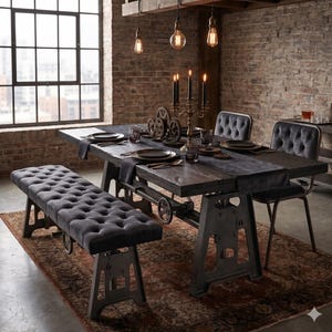 May include: A dining set featuring a dark wood table with a metal crank base, a matching tufted velvet bench, and two tufted velvet chairs. The table is set with black plates, dark glassware, a metal candelabra, and decorative metal gears.