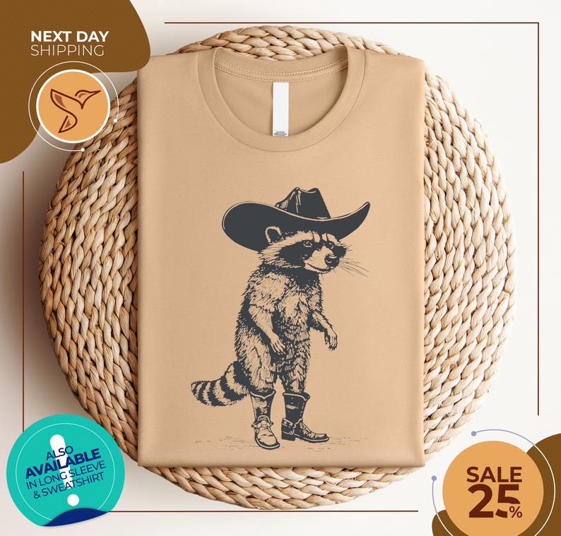 a t - shirt with a raccoon wearing a cowboy hat