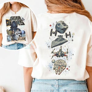 May include: A set of three ceramic mugs with a speckled, matte finish. The mugs are in shades of cream, light gray, and dark gray. Each mug has a simple, minimalist design, perfect for coffee or tea.