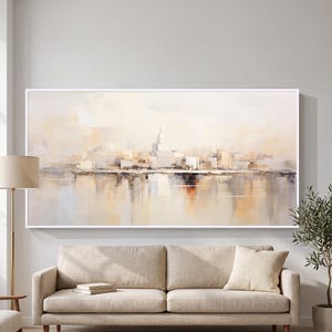 May include: A large rectangular wall art piece featuring an abstract cityscape painting in soft beige, cream, and muted brown tones. The artwork depicts a central domed building silhouette with reflections on a water surface, framed in white.