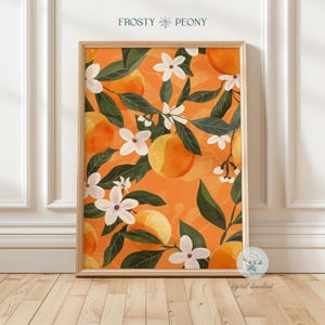 May include: A digital print featuring a pattern of orange blossoms and oranges on a bright orange background. The print is framed in a light wood frame.