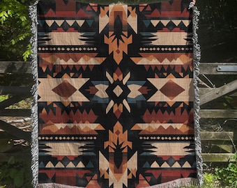 Coperta tessuta con motivi geometrici del sud-ovest americano, di colore rosso, arazzo artistico ispirato ai nativi americani.