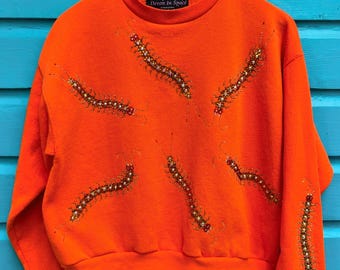 Rhinestone centipedes everywhere orange sweatshirt Unsex M reference measurements