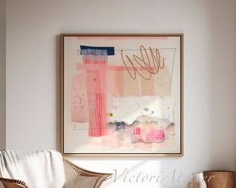 May include: Abstract art painting with pink, beige, and white colors. The painting is framed and hanging on a white wall in a living room setting.