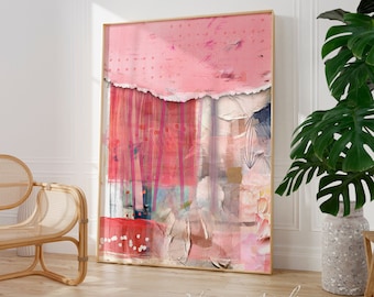 May include: Abstract art print with pink, red, and white colors. The print has a layered, textured look with a torn paper effect. The print is framed in a light wood frame.