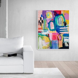 May include: Abstract painting featuring vibrant colours, including pink, blue, green, yellow, and black. The painting incorporates geometric shapes and lines, creating a dynamic and energetic composition.
