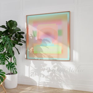 May include: Abstract geometric art print with a pastel color palette of pink, orange, yellow, green, and blue. The print is framed in a light wood frame.