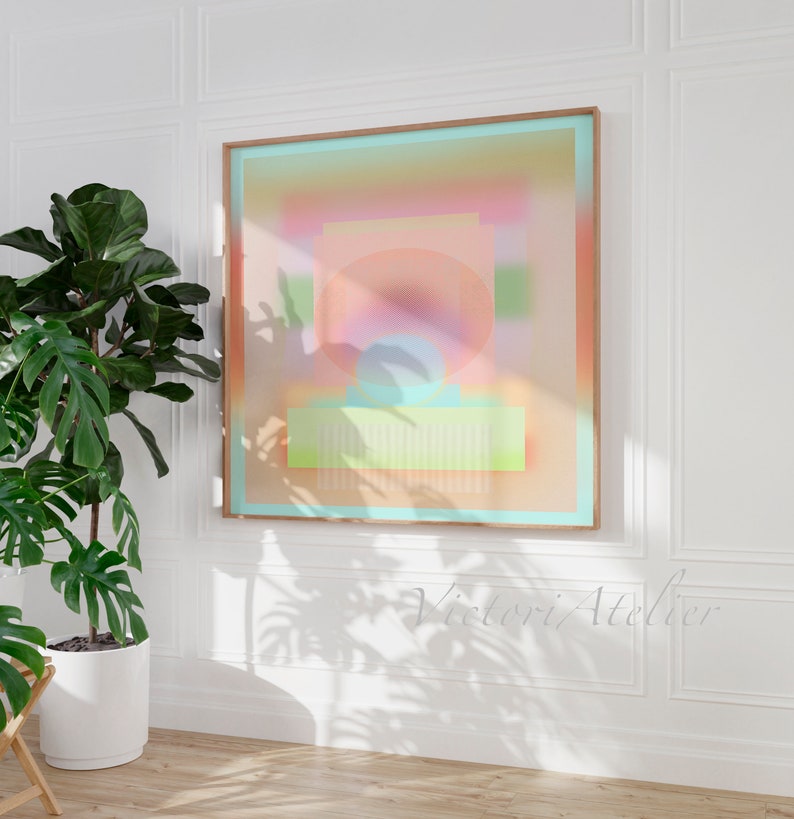 May include: Abstract geometric art print with a pastel color palette of pink, orange, yellow, green, and blue. The print is framed in a light wood frame.