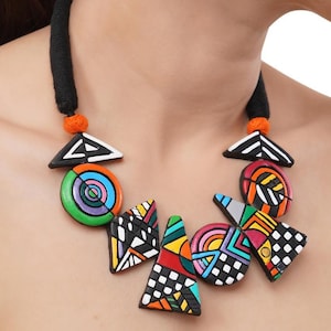 Que Sera Sera Earrings in Terracotta Que Sera Sera Earrings in Terracotta