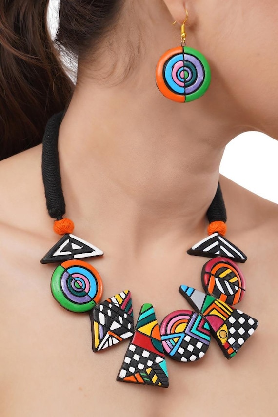 Que Sera Sera Earrings in Terracotta Que Sera Sera Earrings in Terracotta