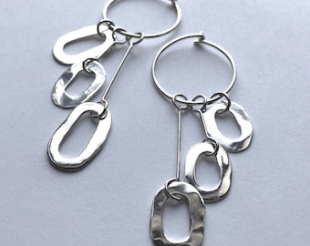 Oval drop sterling silver hoop earrings