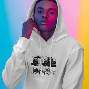 May include: White hooded sweatshirt with a black and white graphic print of characters from the anime Jujutsu Kaisen. The characters are in a group hug and the text "Jujutsu Kaisen" is printed below them.
